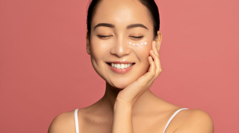 a female model who is happy with her skin health