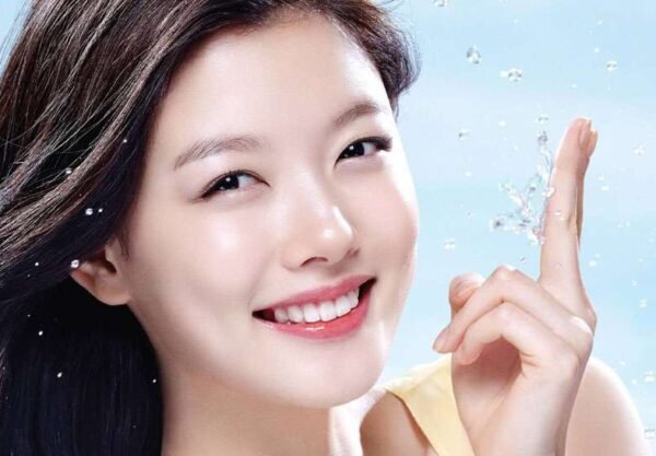 A beauty model showin the output of Korean skincare rouitne