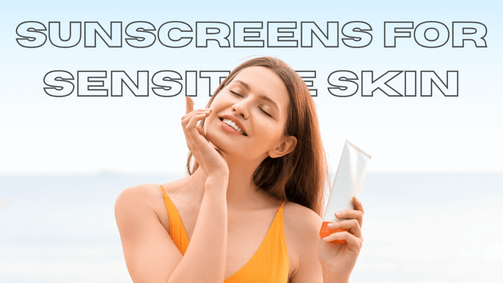 a model on the beach applying one of the best sunscreens for sensitive skin on her face.